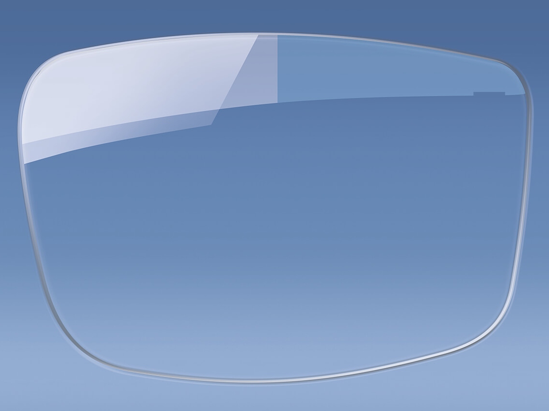 Illustration of a spectacle lens with and without anti-reflective coating 